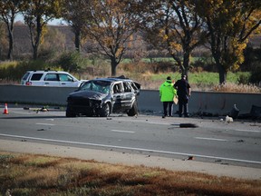 Police continue to investigate two multi-vehicle collisions that killed one person and sent others to hospital early on Friday, November 4, 2016. Highway 401 was closed in both directions near Woodstock, from Mill Street to Foldens Line. (MEGAN STACEY/Sentinel-Review)