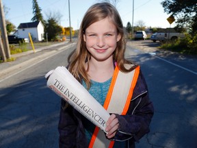 Luke Hendry/The Intelligencer
Paige Leadbeater, 11, begins her Intelligencer delivery route Friday in Cannifton. She came to the rescue of an 85-year-old subscriber who had fallen. The woman has recovered.