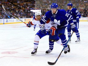 Leafs coach Mike Babcock and defenceman Morgan Rielly have been singing the praises of blueliner Nikita Zaitsev (right). (Getty Images)