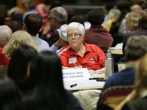 Taxpayers and concerned citizens work in small groups during budget consultations at city hall.