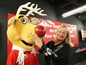 Lesli Green, president of Operation Red Nose, and Rudy the mascot were on hand at the launch of the annual campaign to combat drinking and driving in Sudbury, Ont. on Friday November 4, 2016. John Lappa/Sudbury Star/Postmedia Network