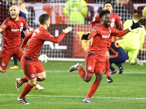 TFC’s Tosaint Ricketts (right) celebrates his late goal against NYCFC last week at BMO Field. (THE CANADIAN PRESS)