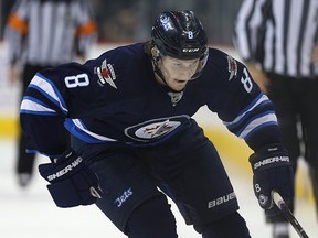 Winnipeg Jets defenceman Jacob Trouba speeds into the Philadelphia Flyers zone during NHL action in Winnipeg on Nov. 7, 2015. (Kevin King/Winnipeg Sun/Postmedia Network)