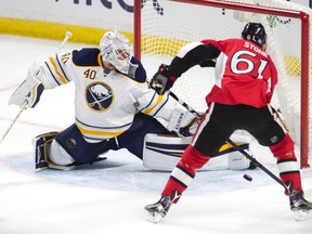 Buffalo Sabres goalie Robin Lehner stops Ottawa Senators right winger Mark Stone from scoring during second period NHL action on Nov. 5, 2016 in Ottawa. (THE CANADIAN PRESS/Adrian Wyld)