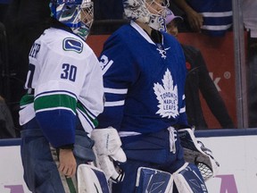 Vancouver Canucks goalie Ryan Miller (30) and Toronto Maple Leafs goalie Frederik Andersen (31) after fight on Saturday November 5, 2016. Craig Robertson/Toronto Sun/Postmedia Network