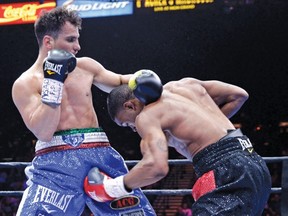 Phil Lo Greco, getting hit below the belt during a fight last year against Errol Spence Jr., in Las Vegas, may have felt the same way after a massage therapist recently refused him for supporting Donald Trump’s views on immigration. (Getty Images)