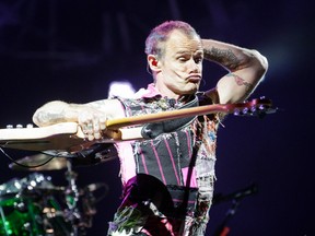 Bassist Flea of the Red Hot Chili Peppers performs during the Osheaga Music Festival at Jean-Drapeau Park in Montreal on Friday, July 29, 2016. (Postmedia Network file photo)
