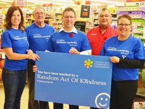 A kickoff event for Random Act of Kindness Day was held by the Stratford Perth Community Foundation (SPCF) at Walkom's valu-mart in Mitchell early last Friday, Nov. 4, where politicians, SPCF board members and residents of West Perth discussed the benefits of kindness and what a random act of kindness could entail. Pictured, SPCF board member and co-chair of the Random Act of Kindness Day committee Helen Dowd (left), West Perth Mayor Walter McKenzie, Perth-Wellington MP John Nater, owner of Walkom's valu-mart Steve Walkom, and Random Act of Kindness Day committee member Julie Haefling. GALEN SIMMONS MITCHELL ADVOCATE