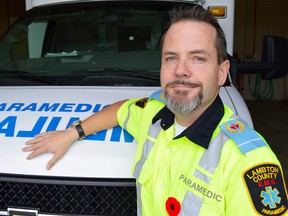 Grant Purdy and other Lambton County paramedics are wearing their light blue epaulets in November to raise prostate cancer awareness, one of the most common types of cancer among men. Melissa Schilz/Postmedia Network