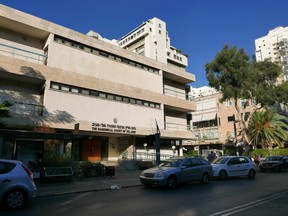 The headquarters of the chief rabbinate in Tel Aviv, Israel, Nov. 5, 2016. The rabbinate is a state-sanctioned institution that controls all matter of marriage and divorce in Israel. An American citizen has been holed up in a Jerusalem apartment for more than a year, unable to return to his home in the U.S. after an Israeli rabbinical court confiscated his passport and banned him from traveling, claiming he’s the reason his son won’t grant a divorce to his estranged wife for my than a decade. (AP Photo/Dan Perry)