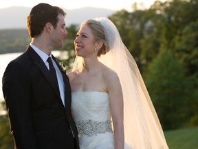 In this handout image provided by Barbara Kinney, Marc Mezvinsky (L) and Chelsea Clinton pose during their wedding at the Astor Courts Estate on July 31, 2010 in Rhinebeck, N.Y.  (Barbara Kinney via Getty Images)
