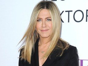 FILE - In this April 13, 2016, file photo, Jennifer Aniston arrives at the Los Angeles premiere of "Mother's Day." In an interview for the Dec. 2016 issue of Marie Claire magazine, Aniston said says she spoke out on shaming in a Huffington Post op-ed in July 2016 because she “has worked too hard in this life and this career to be whittled down to a sad, childless human." (Photo by Richard Shotwell/Invision/AP, File)