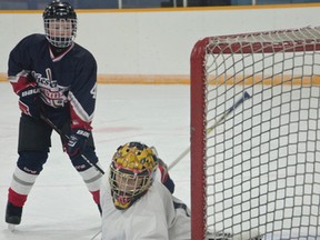 The peewee Chinooks goalie, Koltyn Kipling defends his net against 49 attacks made by the Lakers | Caitlin Clow photo/Pincher Creek Echo