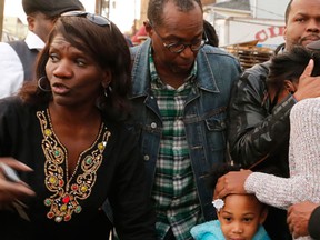 An unidentified women is comforted after learning that at least one person was fatally stabbed during an attack that left multiple other people injured at a house on Hedden Terrace late Saturday afternoon, Nov. 5, 2016, in Newark, N.J. (Robert Sciarrino/NJ Advance Media for NJ.com)