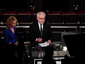 CNN's Dana Bash and Wolf Blitzer report in a emporary auditorium balcony television studio before the start of the third U.S. presidential debate at the Thomas & Mack Center on October 19, 2016 in Las Vegas, Nevada. (Photo by Ethan Miller/Getty Images)