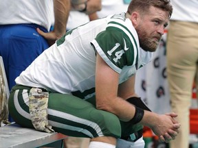 Jets quarterback Ryan Fitzpatrick sits on the sidelines during the second half against the Dolphins in Miami Gardens, Fla., on Sunday, Nov. 6, 2016. (Lynne Sladky/AP Photo)