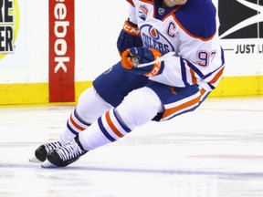 Connor McDavid says he still tracks Sidney Crosby's exploits. (Getty Images)
