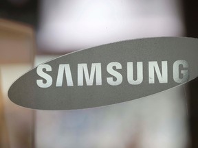 In this Oct. 5, 2016 file photo, the corporate logo of Samsung Electronics Co. is seen at its shop in Seoul, South Korea. Nearly 3 million Samsung washing machines are being recalled in the U.S. following multiple injuries, including a broken jaw, due to “excessive vibration.” The recall Friday, Nov. 4, affects 34 models of washing machines manufactured between 2011 and this year. (AP Photo/Lee Jin-man)