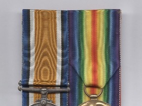 War medals of George Lawrence Price are shown in a handout photo. George Lawrence Price was just one of the estimated 66,000 Canadians who died during or as a result of the First World War. By many accounts, his service during what was hoped to be "the war to end war" was unremarkable, except that he is widely believed to have been the last Canadian - indeed the last Commonwealth soldier - killed before armistice took effect at 11 a.m. on Nov. 11, 1918. (THE CANADIAN PRESS/HO-Canadian War Museum)