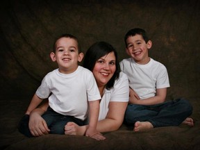 Noah Barthe, 4, and Connor Barthe, 6, seen with their mother Mandy Trecartin, were found dead Monday, Aug. 5, 2013, in Campbellton, N.B. It's believe they were killed by an African rock python. (Facebook/Toronto Sun/QMI Agency)