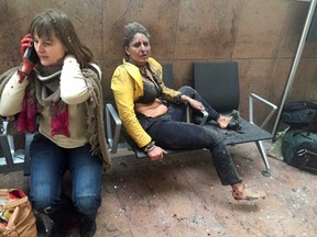 Nidhi Chaphekar, a 40-year-old Jet Airways flight attendant from Mumbai, right, and another unidentified woman after being wounded in Brussels Airport in Brussels, Belgium on Tuesday, March 22, 2016. (Ketevan Kardava/ Georgian Public Broadcaster via AP)