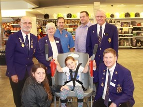 The Sarnia Elks and Sarnia's Real Canadian Superstore teamed up to purchase a specially-designed, accessible shopping cart, which they unveiled on Friday, Oct. 28. Back row: Sarnia Elks Alec Brander, Donna Clendenning, Randy Clendenning, Real Canadian Superstore manager Rob Ware, Sarnia Elk Paul Clendenning. Front row: Kortnee Tully, Kassidi Tully, and Sarnia Elk Rick McAlpine.
CARL HNATYSHYN/SARNIA THIS WEEK