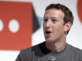FILES- This file photo taken on March 2, 2015 shows Facebook's creator Mark Zuckerberg speaks on the opening day of the 2015 Mobile World Congress (MWC) in Barcelona. The State prosecutor's office in Munich has initiated an investigation against Facebook's managers for causing incitement of the people according to Der Spiegel magazine on November 4, 2016 in advance from its new issue. (AFP PHOTO/ LLUIS GENELLUIS GENE/GETTY)