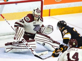 Peterborough Petes' goalie Matt Mancina makes a save against Sarnia Sting forward Nikita Korostelev in this Postmedia file photo. Korostelev has contributed five of his team's 12 power-play goals this season but the rest of the group has been struggling of late. Clifford Skarstedt/Peterborough Examiner/Postmedia Network
