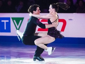Canada's Scott Moir and Tessa Virtue perform during the 2016 Skate Canada International exhibition gala in Mississauga, Ont., on Sunday, Oct. 30, 2016. (Mark Blinch/The Canadian Press)