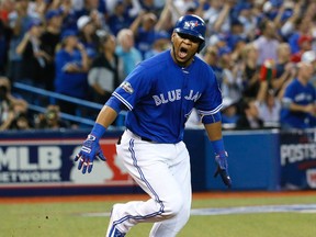 Edwin Encarnacion reacts to his two-run double for the Blue Jays in Game 4 of the American League Championship Series against the Indians in Toronto on Oct. 18, 2016. (Stan Behal/Toronto Sun)