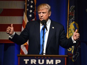 Republican presidential candidate Donald Trump gives the thumbs-up during a campaign rally at the Lackawanna College Student Union in downtown Scranton, Pa., Monday, Nov. 7, 2016. (Butch Comegys/The Times & Tribune via AP)