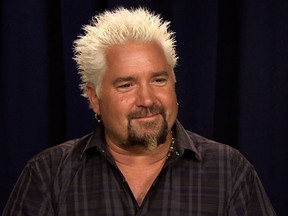 This Oct. 11, 2016 image taken from video shows celebrity chef Guy Fieri during an interview in New York. (AP Photo/Bruce Barton)