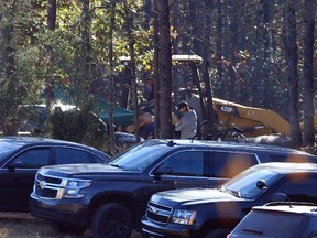 Excavation and search work continues on Todd Kohlhepp's property in Woodruff, S.C. Monday, Nov. 7, 2016.  (AP Photo/Richard Shiro)