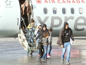 Members of the Al-Saeed family arrived at the Greater Sudbury Airport in Sudbury, Ont. on Wednesday November 9, 2016. The Syrian newcomers  who fled Syria in 2013 were sponsored by Northern Hope and will reside in Greater Sudbury.Gino Donato/Sudbury Star/Postmedia Network