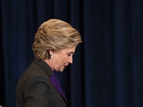 Democratic presidential candidate Hillary Clinton walks off the stage after speaking in New York, Wednesday, Nov. 9, 2016. Clinton conceded the presidency to Donald Trump in a phone call early Wednesday morning, a stunning end to a campaign that appeared poised right up until election day to make her the first woman elected U.S. president.(AP Photo/Matt Rourke)