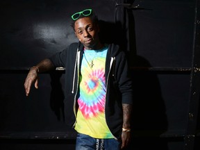 In this Feb. 1, 2013 file photo, recording artist Lil Wayne poses in New Orleans. (Jordan Strauss/Invision/AP, File)