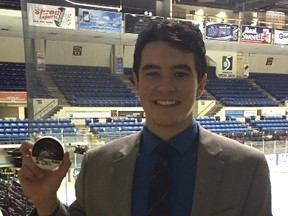 Sudbury's Damien Giroux shows the puck from his first career OHL goal he scored against Mississauga on Oct. 15. The former standout with the Sudbury Wolves Minor Midgets has has his season on hold since about a week after scoring the goal after undergoing emergency surgery. Special to The Star