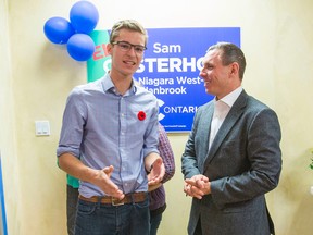 Sam Oosterhoff and Progressive Conservative Leader Patrick Brown (right) as the 19-year-old formally opened his campaign office for the Niagara West-Glanbrook byelection on Saturday, October 29, 2016 in Beamsville. (Bob Tymczyszyn/Postmedia Network)