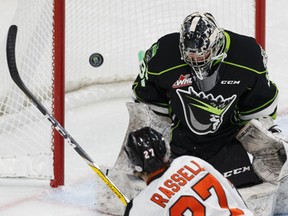 Edmonton goaltender Liam Hughes stops Medicine Hat's Mark Rassell during a game on Oct. 29 at Rogers Place (Ian Kucerak)