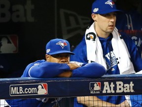 Blue Jays pitchers Marcus Stroman (left) and Aaron Sanchez (right) watch Game 5 of the American League Championship Series against the Indians in Toronto on Oct. 19, 2016. (Stan Behal/Toronto Sun)