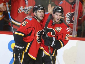Mark Giordano and Sean Monahan led the Flames power-play scoring last season but have struggled to put up points on the power play this season. (Al Charest)