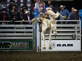 Saddle Bronc rider Layton Green during the first go-round at the Canadian Finals Rodeo at Northlands Coliseum on Wednesday. (David Bloom)