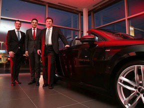 Joel Paquette, general manager of Audi Sudbury, along with Daniel Weissland, president of Audi Canada, and Marc Paquette, dealer principal at Audi Sudbury, during the car dealership's grand opening party on Wednesday night, featuring a new state-of-the-art building. Gino Donato/The Sudbury Star