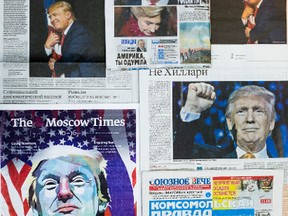 Front pages of Russian nation-wide daily newspapers with photos of US President-elect Donald Trump, as published in Moscow, Russia on Thursday, Nov. 10, 2016. Deputy Russian Foreign Minister Sergei Ryabkov is quoted Thursday by the Russian Interfax news agency saying that "there were contacts" by Russia with influential people in Trump's circle before his election. (AP Photo/Alexander Zemlianichenko)