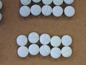 This undated handout photo shows fentanyl pills. THE CANADIAN PRESS