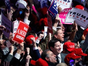 Supporters cheer as they wait for President-elect Donald Trump to give his acceptance speech during his election night rally, Wednesday, Nov. 9, 2016, in New York. (AP Photo/Mary Altaffer)