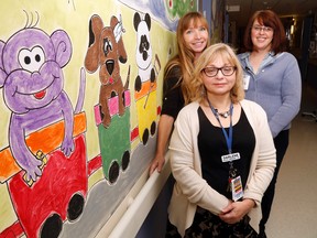 Luke Hendry/The Intelligencer
Community Health Centre case manager Dolores Turner, left, and Quinte Health Care's Darlene Stuckless, centre, and Shelley Kay stand in a maternity-department hallway of Belleville General Hospital Thursday. They're part of a new program to help mothers and babies affected by opiate use or abuse.