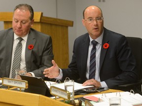 London Mayor Matt Brown, right, and police budget chair Paul Paolatto during a meeting of the Police Services Board held at Police Headquarters on Thursday Nov 10, 2016. (MORRIS LAMONT, The London Free Press)