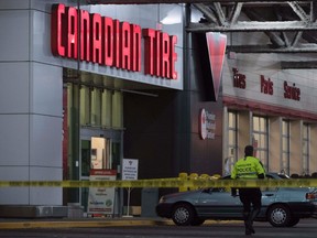 Police are seen outside a Canadian Tire store in Vancouver, B.C. Thursday, Nov. 10, 2016. Vancouver police responded to what they called a "serious" incident at a Canadian Tire store Thursday afternoon on the city's eastside. THE CANADIAN PRESS/Jonathan Hayward