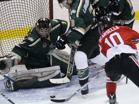 Alec Scarsella of the Sarnia Legionnaires tries to chip a loose puck past St. Thomas Stars goalie Dan Black during the Greater Ontario Junior Hockey League game at Sarnia Arena on Thursday, Nov. 10, 2016 in Sarnia, Ont. Sarnia won 4-0. (Terry Bridge/Sarnia Observer)